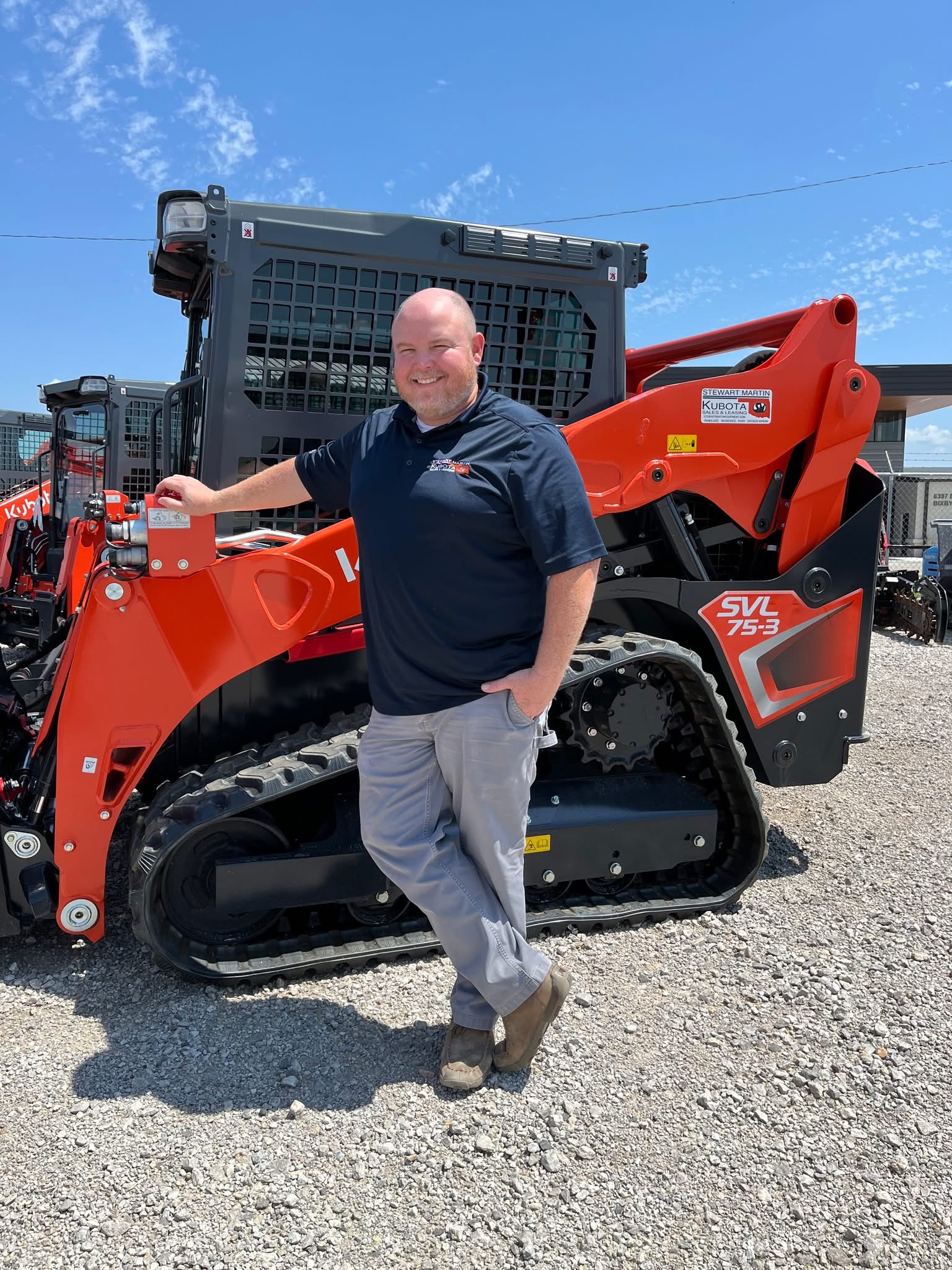 Ryan Nichols with a compact track loader